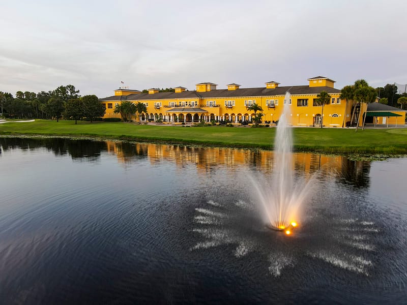 Tampa Palms Golf & Country club, clubhouse wiev with water sprinkle on lake